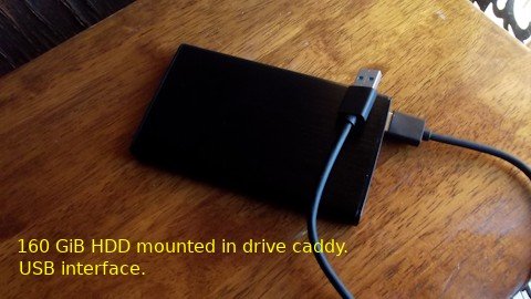160GiB_HDD_in_drive_caddy.jpg